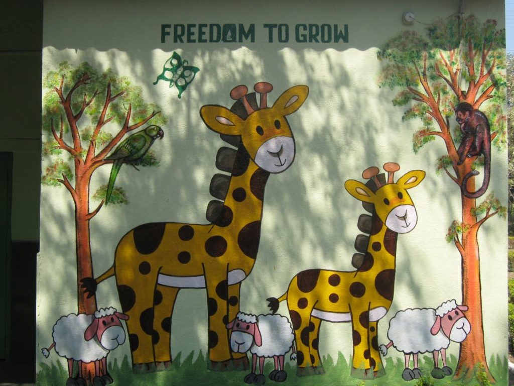 grafitti on a wall at a preschool